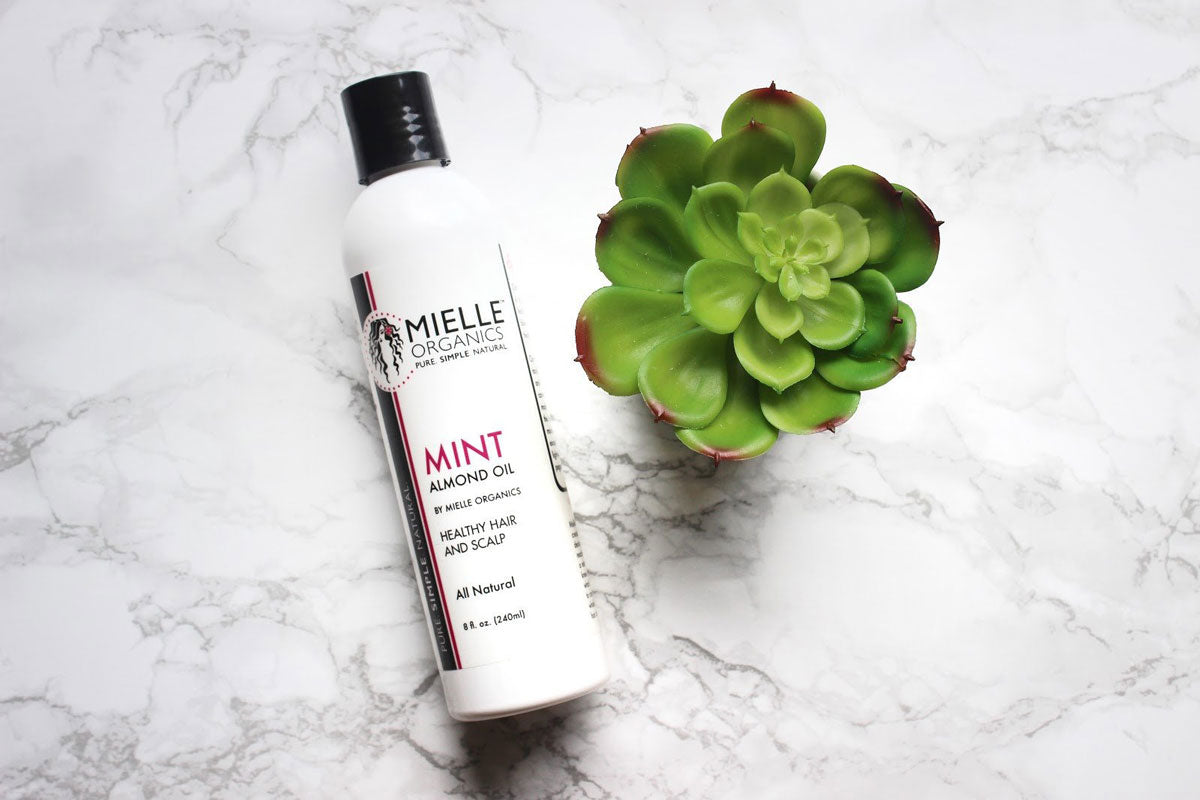 Benefits of Hot Oil Treatments For Natural Hair | Mielle