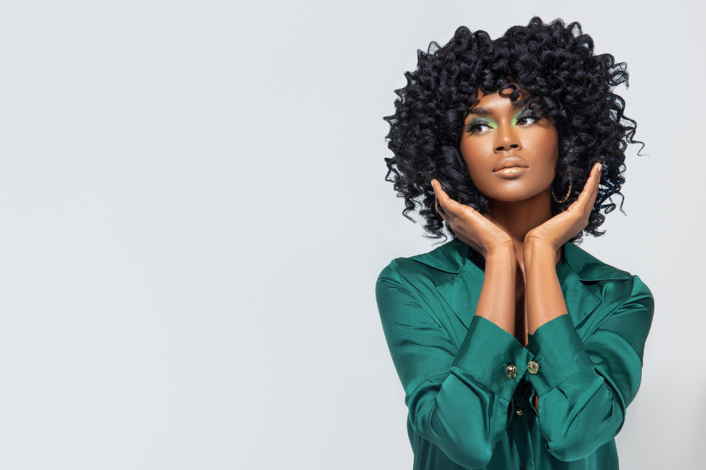 banner image for a blog in which girl is flaunting her hair for hair fall tips.