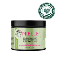 A container of Mielle Rosemary Mint Strengthening Hair Masque with product information and branding visible.