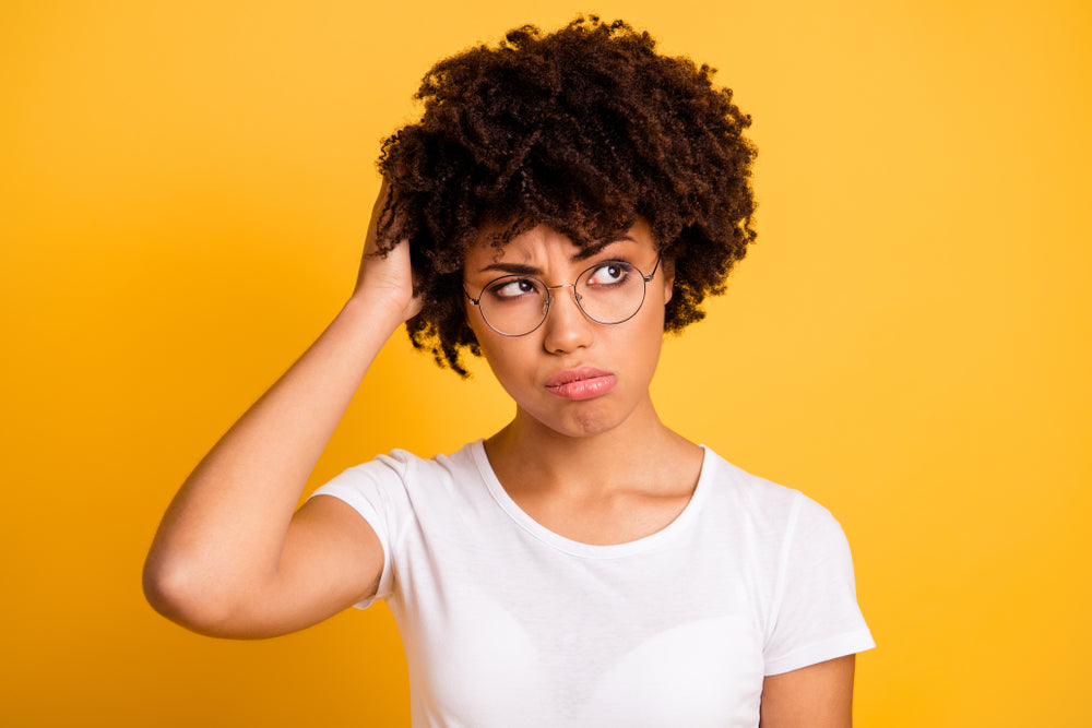 Portrait of her she nice cute attractive beautiful confused wavy-haired woman with eyeglasses